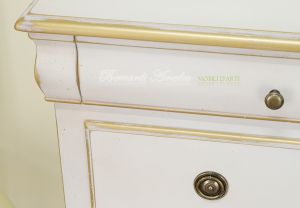 Classic wooden chest of drawers with lacquered finish